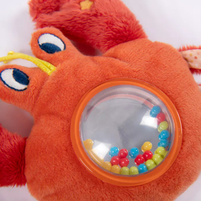 Hochet billes crabe "les aventures de Paulie" Moulin Roty - Maison Continuum