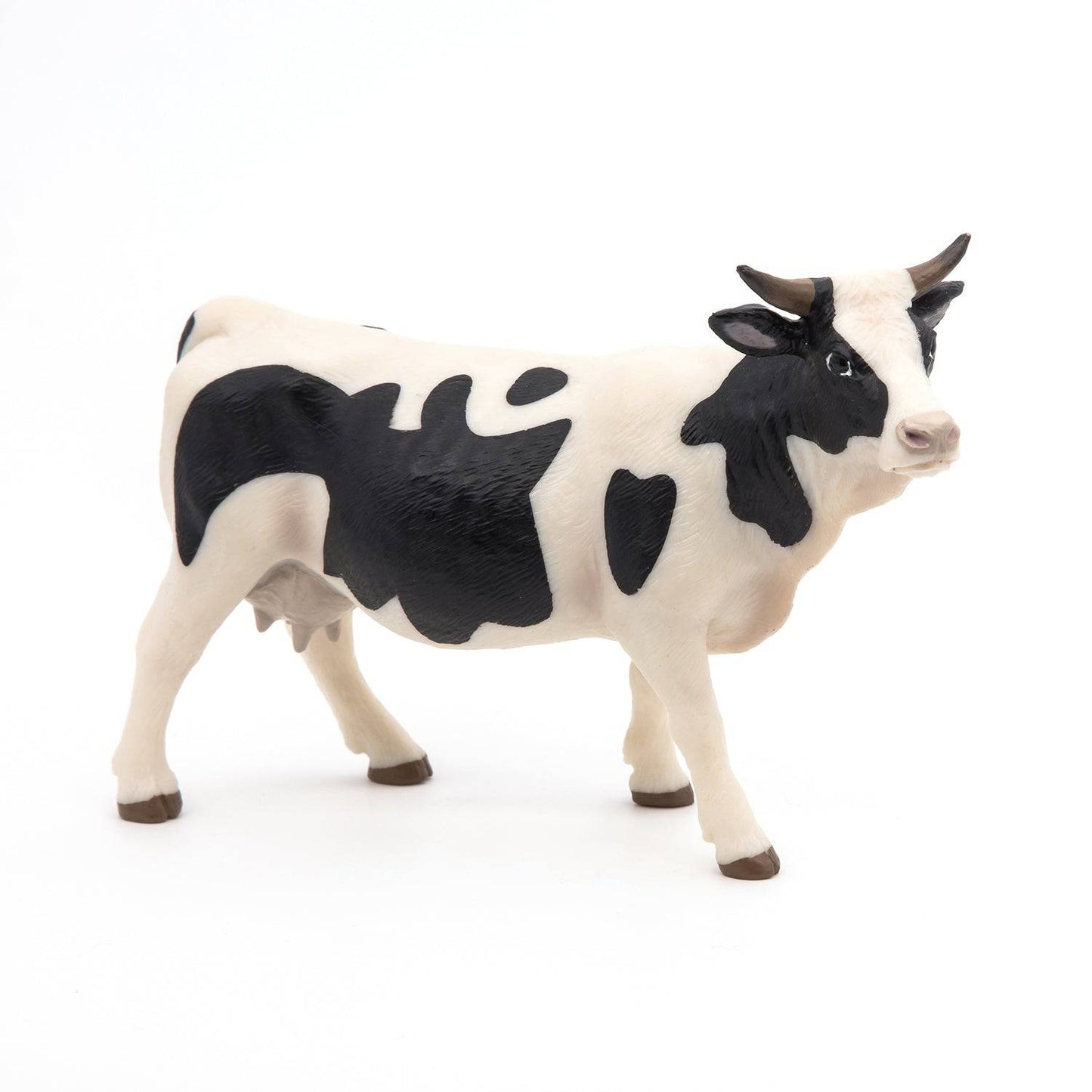 Figurine vache noire et blanche - Maison Continuum
